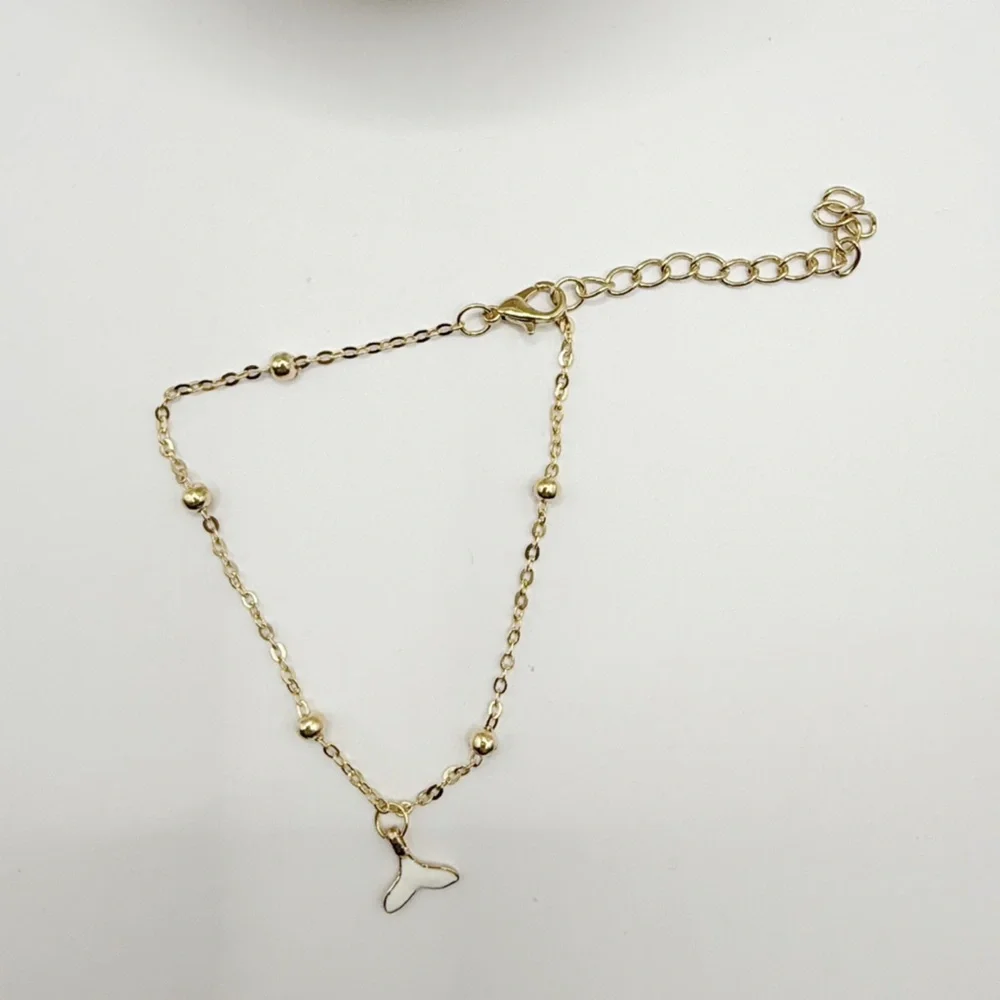 Gold Beaded Bracelet With Whale Tail Charm